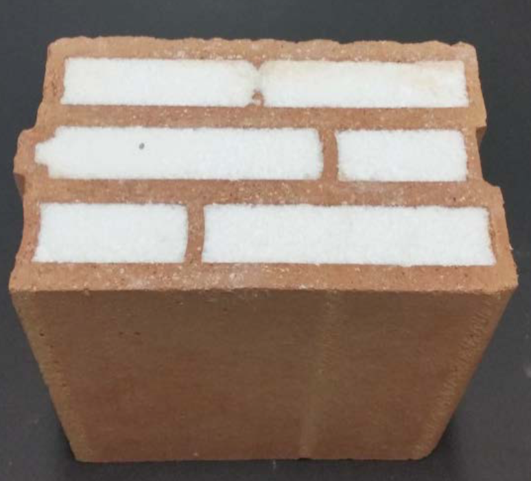 Image of “Aerobrick” — Insulating brick with silica aerogel granule filling.